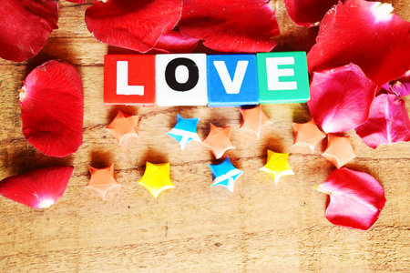 Sweet holiday background with rose and giftsの写真素材