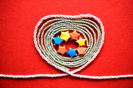 Valentines day card - heart made from wire on red background