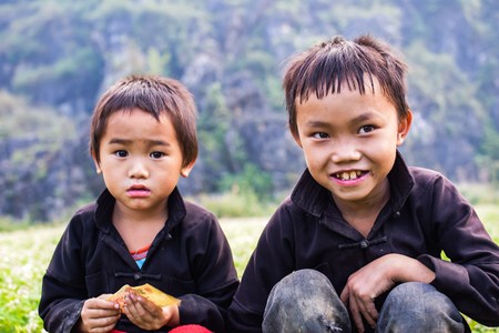 Two children of ethnic Hmong in the markets in Ha Giang, Vietnam. Ha Giang is home to mostly Hmong live.のeditorial素材