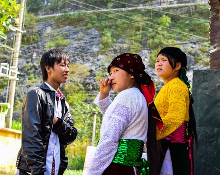 Ha Giang, Viet Nam - November 08, 2015:Unidentified traditionally dressed girls of Hmong ethnic minority tribe in Vietnam. Hmong people are known for their indigo-dyed costumes and ornate silver jewelleryのeditorial素材