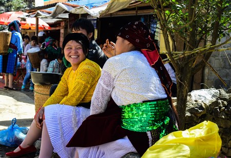 Ha Giang, Viet Nam - November 08, 2015:Unidentified traditionally dressed girls of Hmong ethnic minority tribe in Vietnam. Hmong people are known for their indigo-dyed costumes and ornate silver jewelleryのeditorial素材