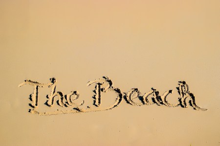 Summer camp written on sandy beach sideの写真素材