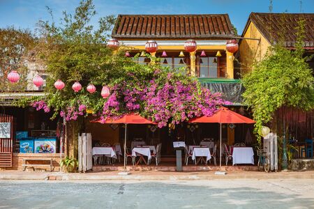 HOI AN, VIETNAM - MARCH 15, 2017: Ancient street view on a nice dayのeditorial素材