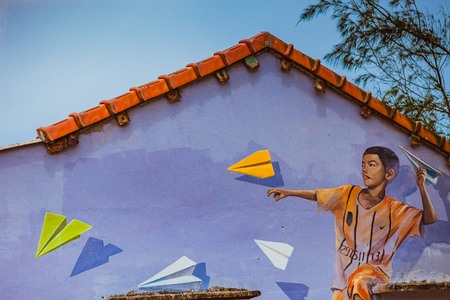 TAM THANH, TAM KY, VIETNAM - MARCH 16, 2017: Painted wall, Street arts in Tam Thanh mural Villageのeditorial素材