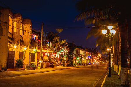 HOI AN, VIETNAM - MARCH 17, 2017:  traditional yellow building in Hoi An city. Hoi An is world heritage site and popular tourist destination of Asia.のeditorial素材