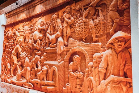 HOI AN, VIETNAM - MARCH 19, 2017: Pottery stuffs are sun-dried in Thanh Ha Pottery Village. The village was formed at the end of the 15th century, by the Thu Bon river, Quang Nam province, Vietnam.のeditorial素材