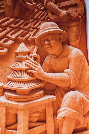 HOI AN, VIETNAM - MARCH 19, 2017: Pottery stuffs are sun-dried in Thanh Ha Pottery Village. The village was formed at the end of the 15th century, by the Thu Bon river, Quang Nam province, Vietnam.のeditorial素材