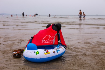 Co To, VIETNAM - APRIL 30, 2017: baby swim ring on the beach in Co To Island (Quang Ninh Province, Vietnam)のeditorial素材