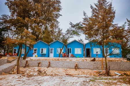 Co To, VIETNAM - APRIL 30, 2017: bungalows color on the background of the sea in Co To Island (Quang Ninh Province, Vietnam)のeditorial素材