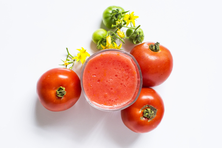 Fresh tomato juice isolated on white backgroundの写真素材