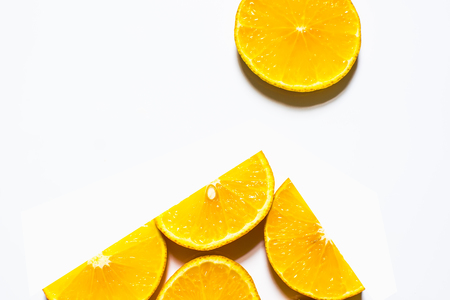 Slices of orange isolated on white background. top view;の写真素材