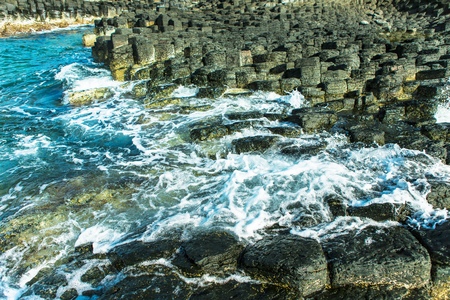 Ganh Da Dia, Phu Yen, Viet Nam, masterpiece of nature, wonderful, fantastic heritage, abstract place for Vietnam travel, rock make great terrain, boat on sea make beauty landscape of ganhdadiaの写真素材