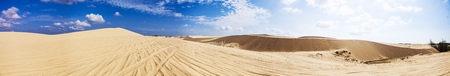 Panaroma Red Sand Dunes and Sky near Mui Ne, Vietnam.