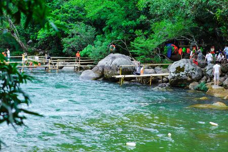 Quang Binh, Vietnam - July 13, 2018: Nuoc Mooc spring - Mooc stream Phong Nha Ke Bang national parkのeditorial素材
