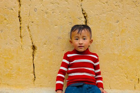 DONG VAN, HA GIANG, VIETNAM, October 27th, 2018: Children of ethnic Hmong in Ha Giang, Vietnam. Ha...