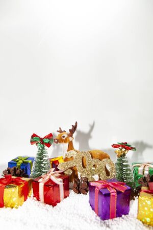 Christmas holiday theme with reindeer and Christmas treesの写真素材