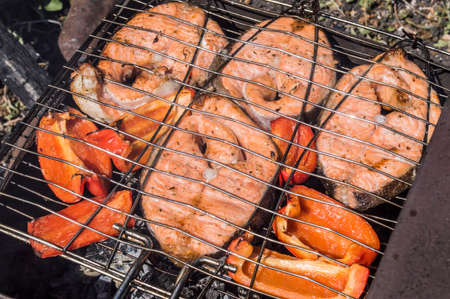 The Norwegian trout on coals, on a latticeの写真素材