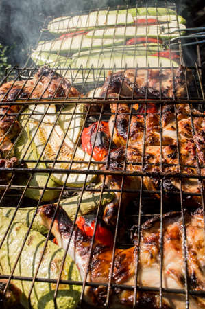 Marinaded chicken fried on coals
