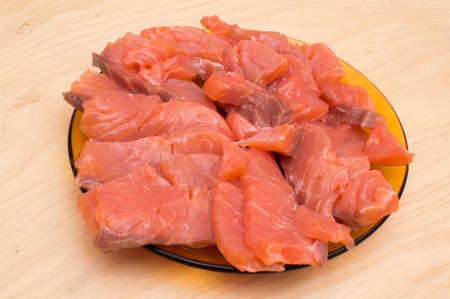 Light-salted Norwegian trout slices on a dish