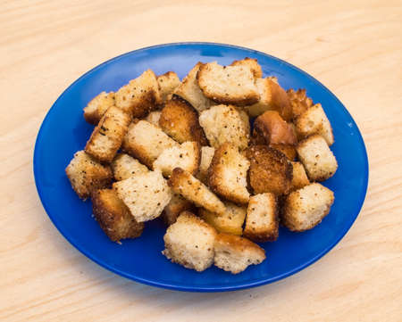 The crackling slices of bread fried with garlicの写真素材