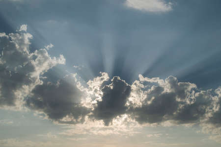 Sunset against clouds and a clear skyの写真素材