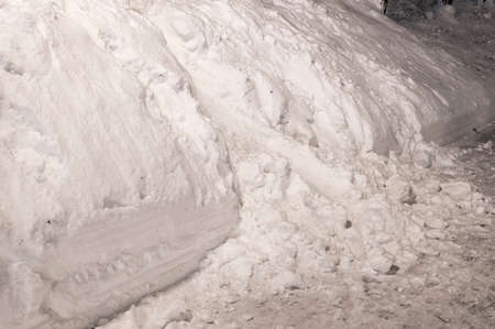 The snowdrift in the downtown at nightの写真素材