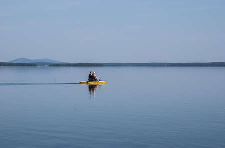 Rest on a catamaran on the summer lakeの写真素材