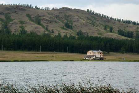 Old mill on the lakeの写真素材