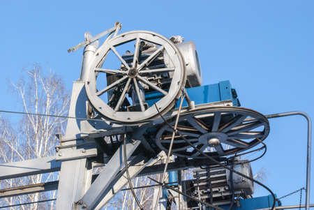 The ropeway engine against the background of the skyの写真素材