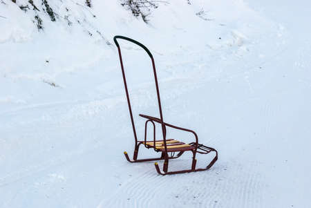 The sledge for children with a back on snowの写真素材