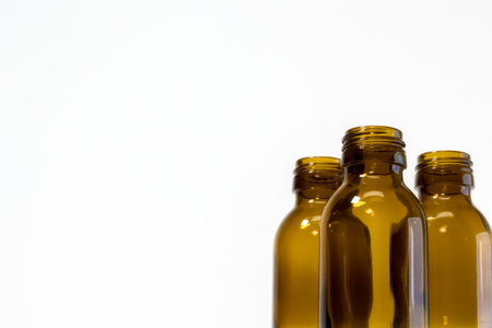 Close-Up of Empty Bottle on White Backgroundの写真素材