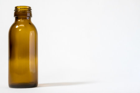 Close-Up of Empty Bottle on White Backgroundの写真素材