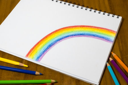 Rainbow drawn with colored pencilsの写真素材