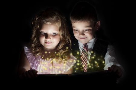 boy and girl discover a magic book, magic inside