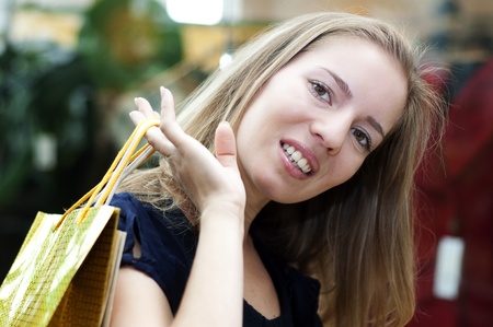 beautiful woman with shopping bags in the mall,の写真素材