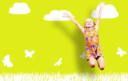 Girl jumping in a color dress with a yellow background  collage of a happy childhoodの写真素材