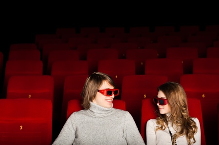 young couple in the cinema to enjoy the movie
