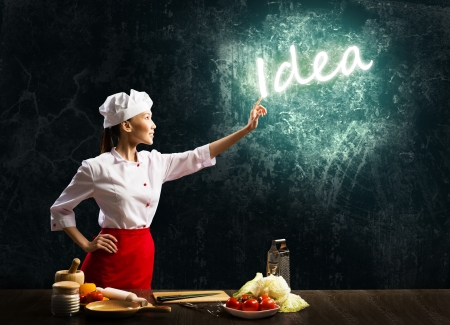 woman cook touch glowing word idea , concept collageの写真素材