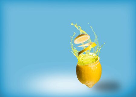 ice and splashes of juice from a lemon, place for textの写真素材