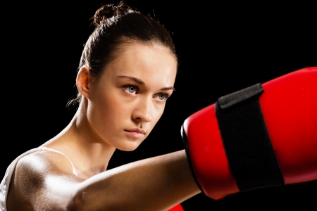 portrait of a woman boxer, aggressive, close-upの写真素材