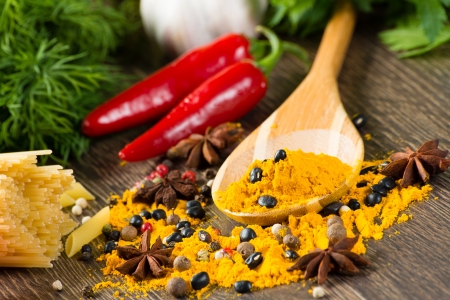 close-up of Asian spices around a wooden blade, still lifeの写真素材