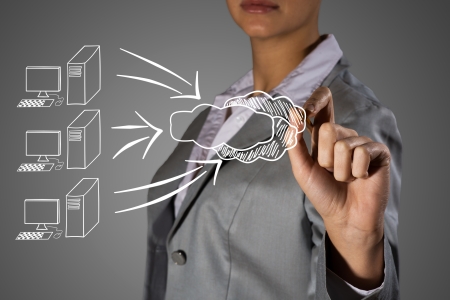 woman s hand draws a picture of the concept of high-tech cloud technologiesの写真素材