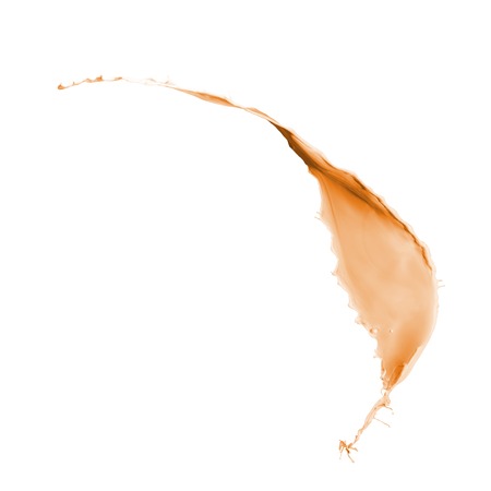orange paint splash isolated on white backgroundの写真素材