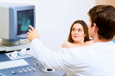 young pregnant woman on the ultrasound, health checkの写真素材