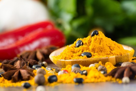 close-up of Asian spices around a wooden blade, still lifeの写真素材