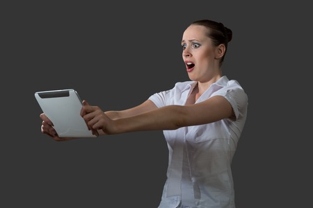 image of young business woman holding a tablet computerの写真素材