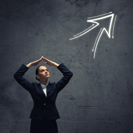 Young upset businesswoman with tears in eyesの写真素材