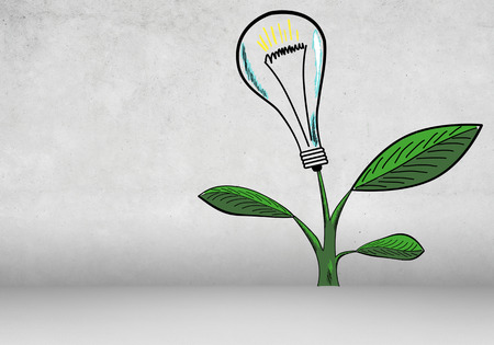 Businesswoman with can watering green sprout with bulbの写真素材