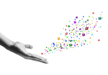 Human hand holding mobile phone and icons flying outの写真素材