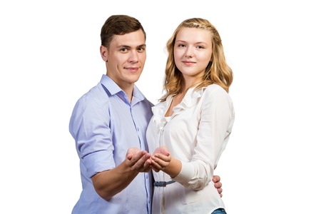 Young happy couple isolated on white backgroundの写真素材